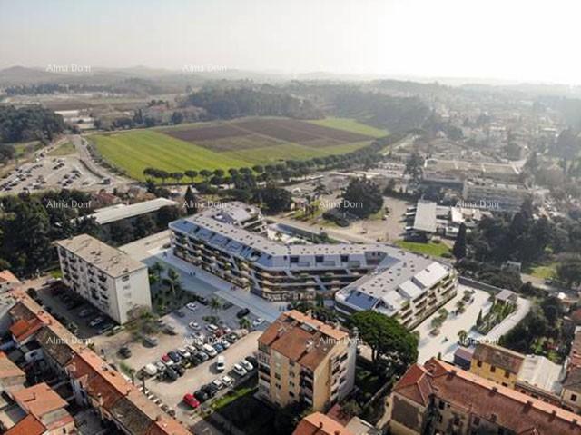Poreč, residential and commercial building under construction with apartments and underground garages