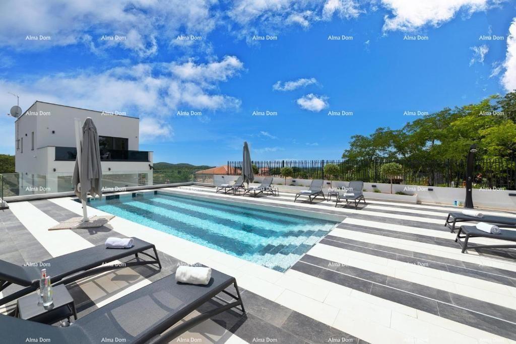 New, modern house with swimming pool.