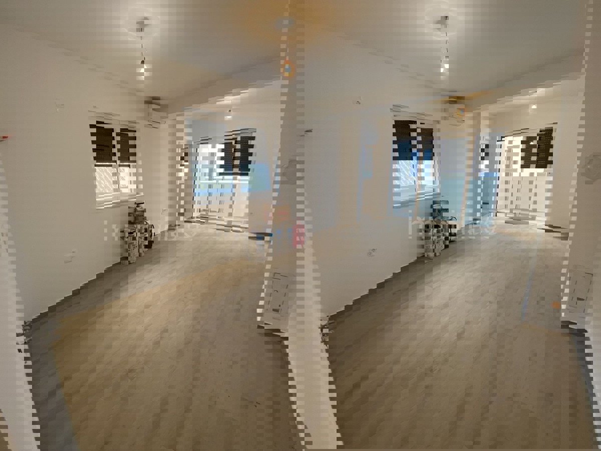 STAN 60 m2,1.KAT, NOVOGRADNJA, LIFT, NATKRIVENI PARKING,PODNO GRIJANJE