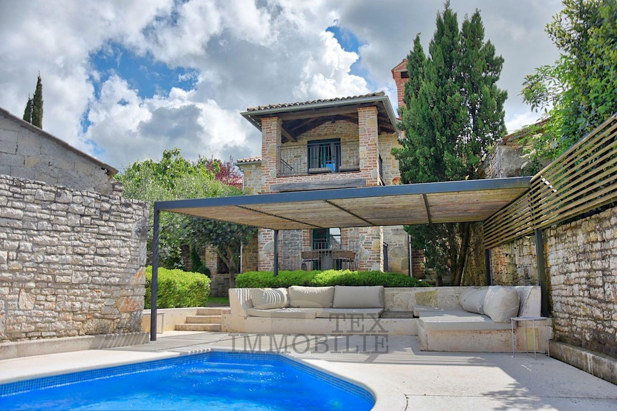 A beautiful renovated stone house with a swimming pool is for sale in a quiet place 20 km from Poreč
