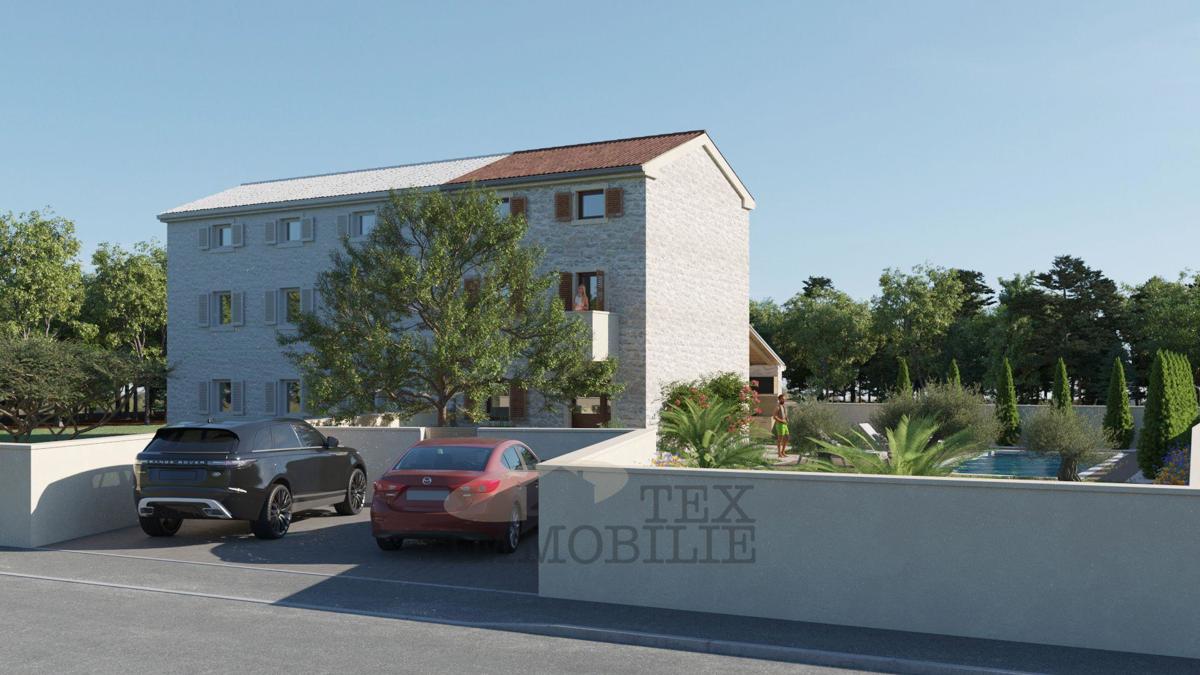 A beautiful renovated stone house with a swimming pool is for sale